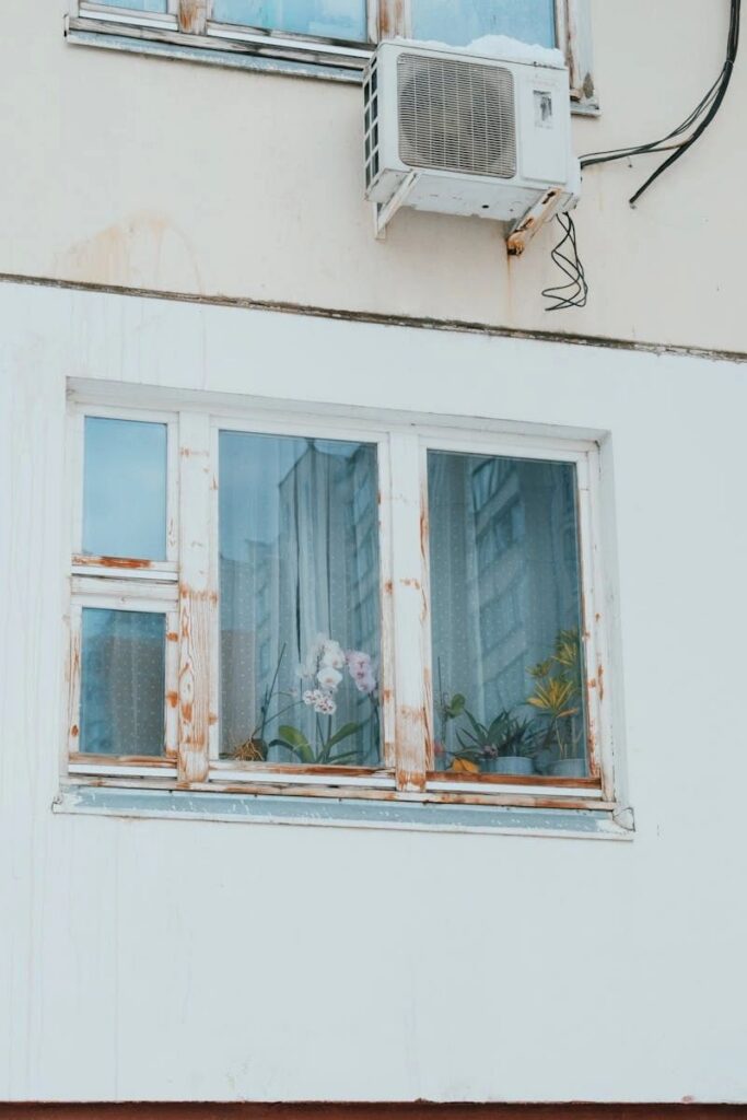 Air Conditioner Fails with leaky old windows, not energy efficient
